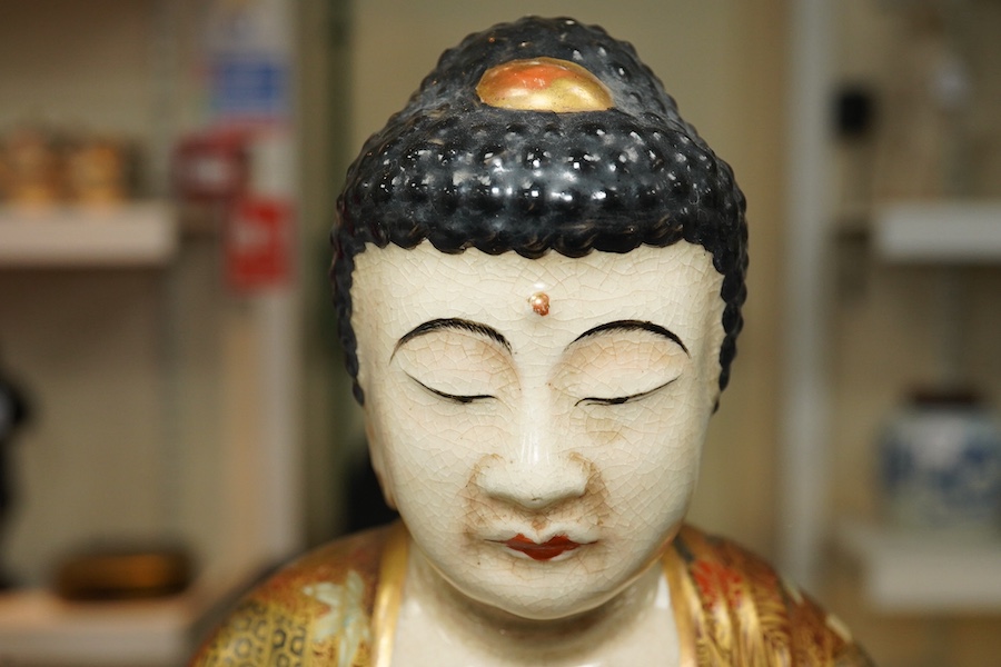 A Japanese Satsuma seated figure of Buddha, Meiji period